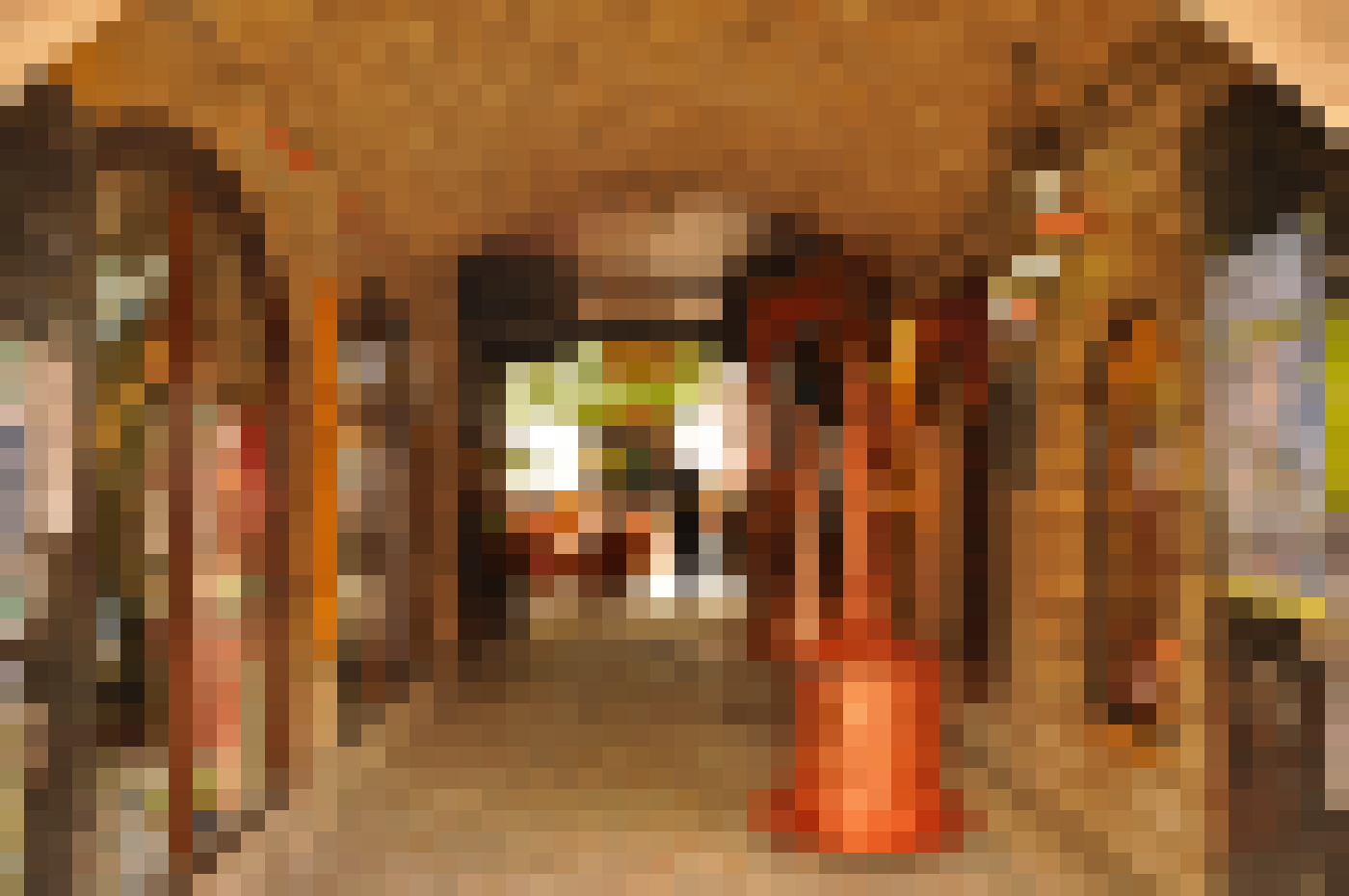 People dine inside the historic Morića Han caravanserai in Sarajevo