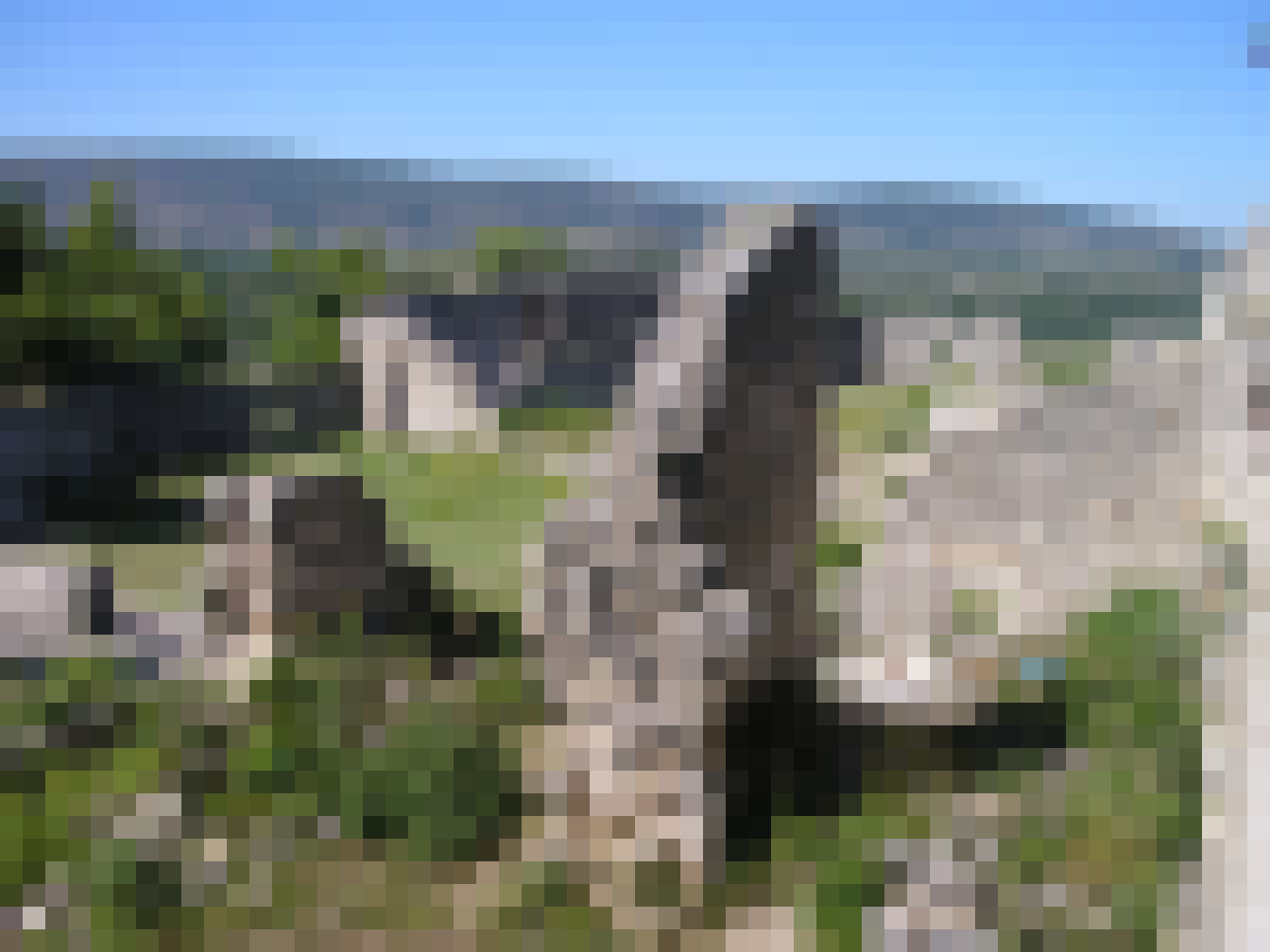 People stroll through stone lanes in Stolac