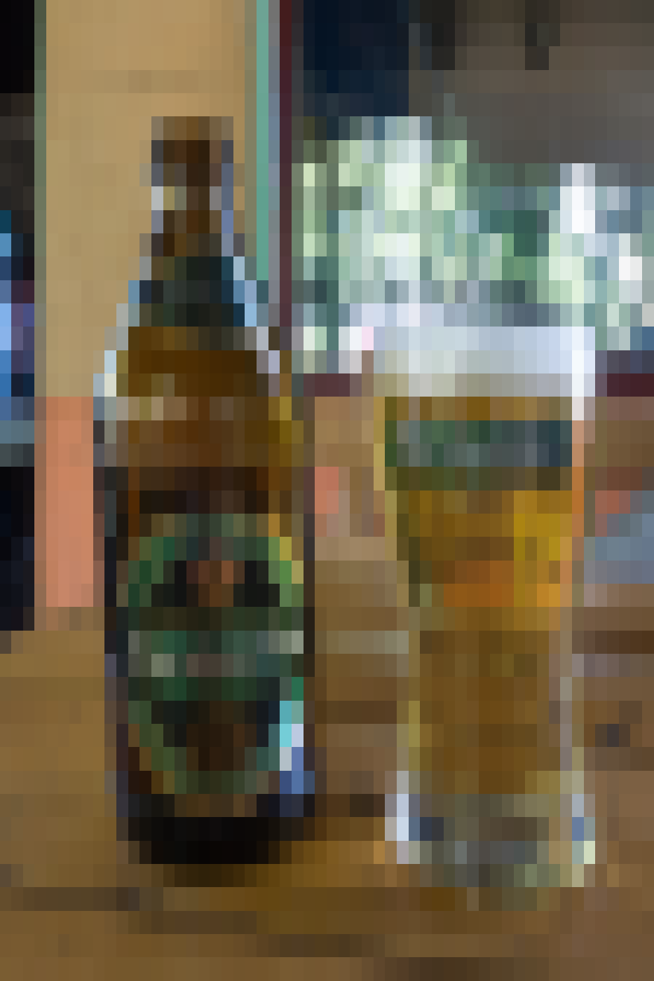 Polygon painting of a Sarajevsko bottle and glass
